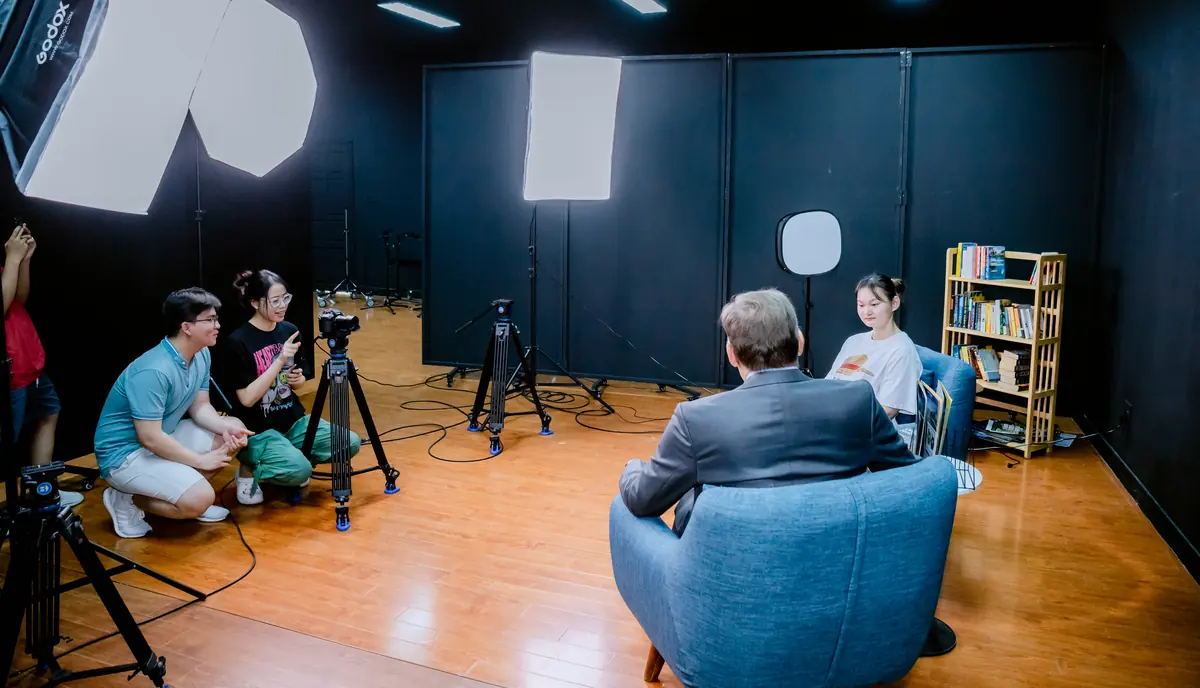 A student camera crew at work in the studio